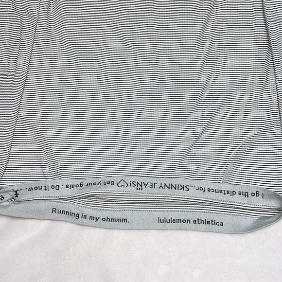 Lululemon long sleeve, no size, clean, small stain - Picture 3 of 8